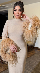 فستان من الكرستال و الريش